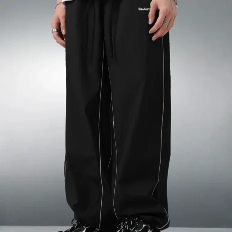 8BE10BA7-BCC5-4200-B336-62764E3DBA95_750x REFLECTIVE STRIPED TRACK PANTS